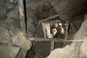 Phil Coles Digging in Crescent Cave Photo by Huw Jones